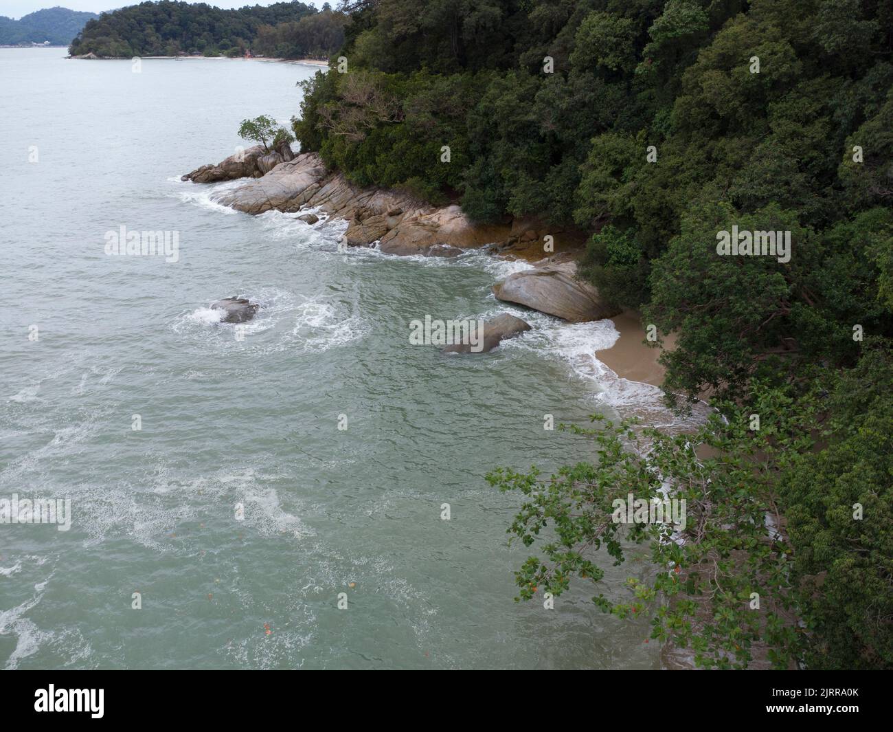 aerial scene of boulders along the sandy beach Stock Photo Alamy