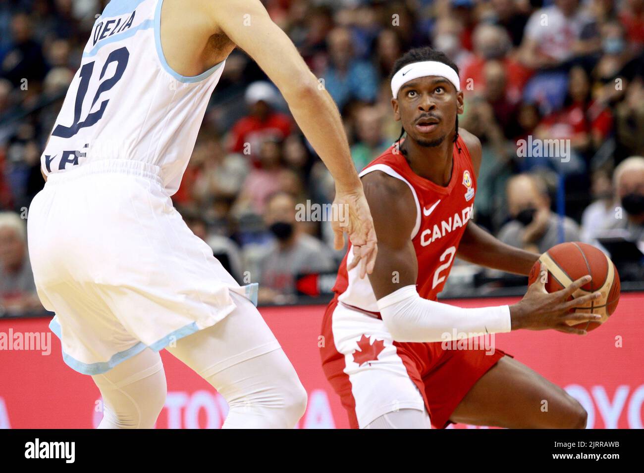 Canada's Shai GilgeousAlexander looks for the basket against Argentina during first half action