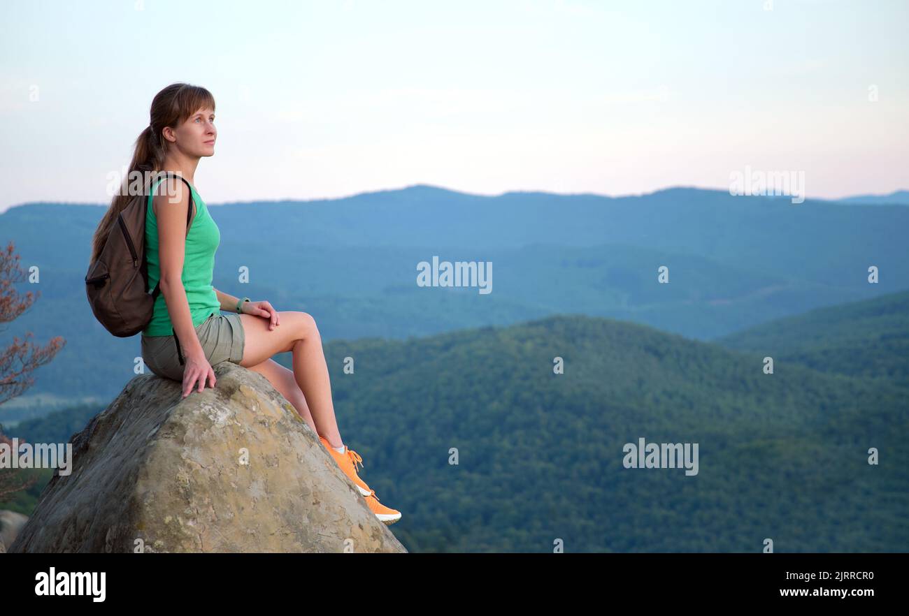 Back view lonely female hiker hi-res stock photography and images - Alamy