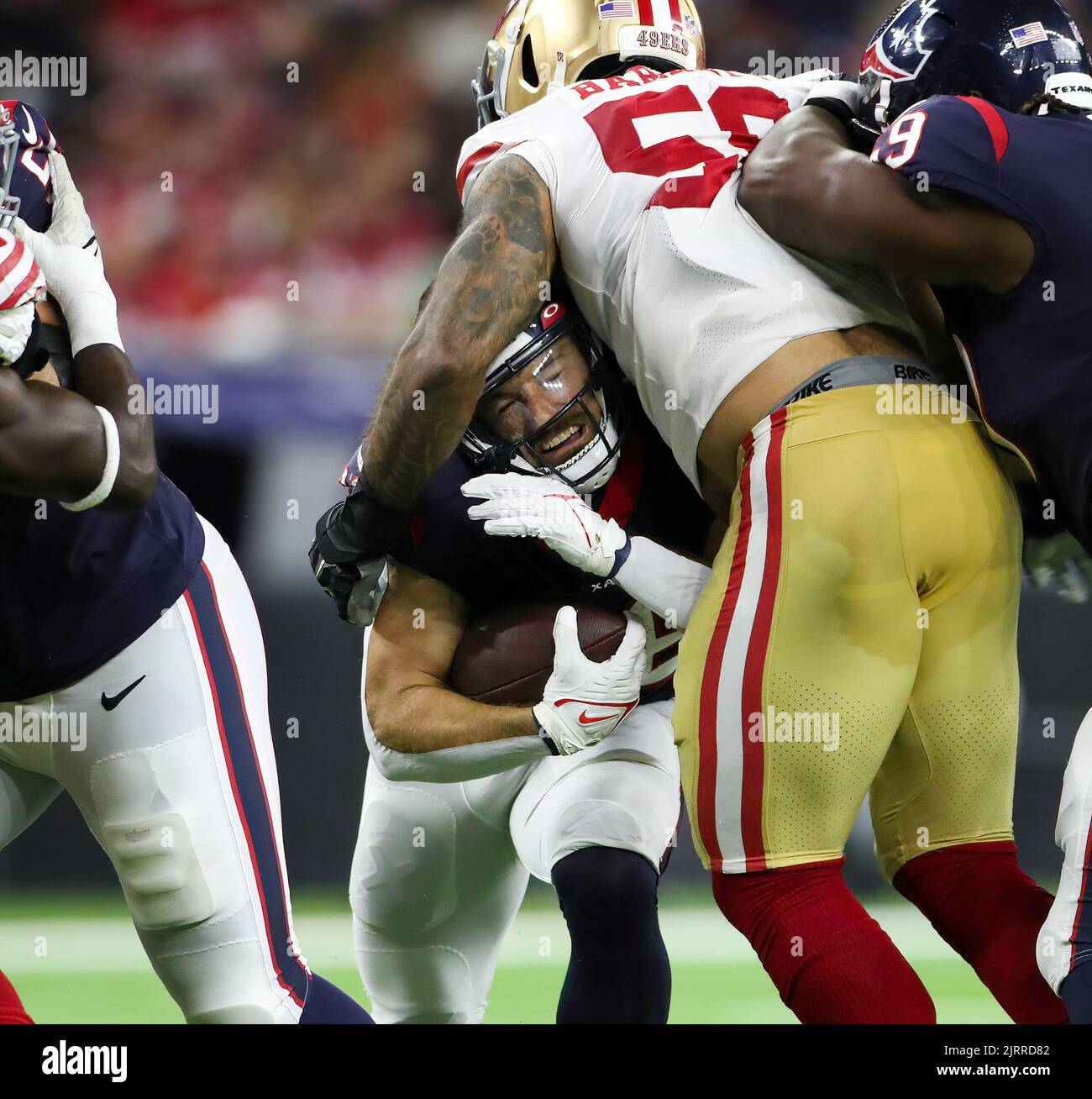 Alex Barrett of the San Francisco 49ers sacks Davis Mills of the News  Photo - Getty Images