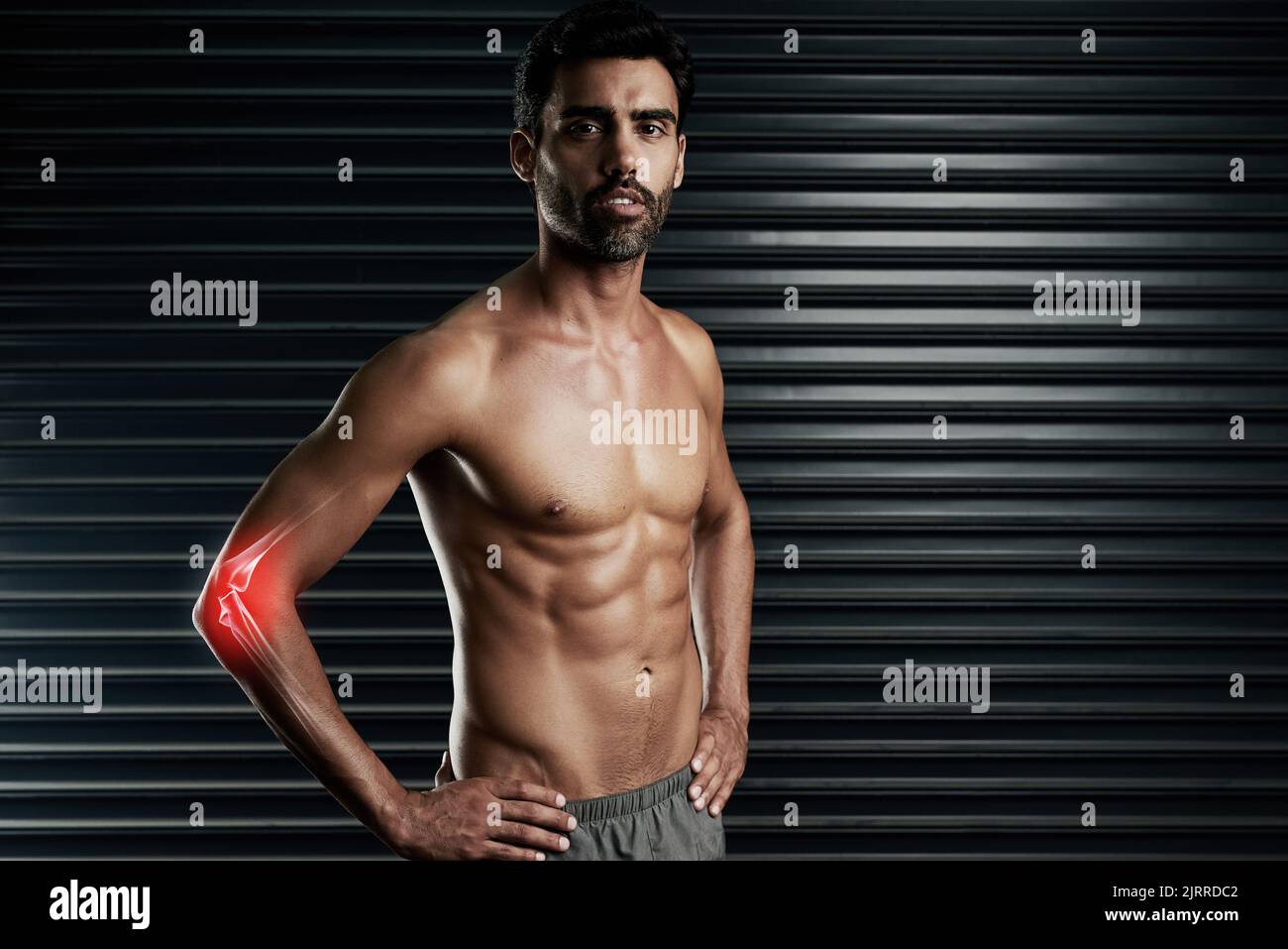 Getting ripped can take its toll on joints. Studio portrait of a