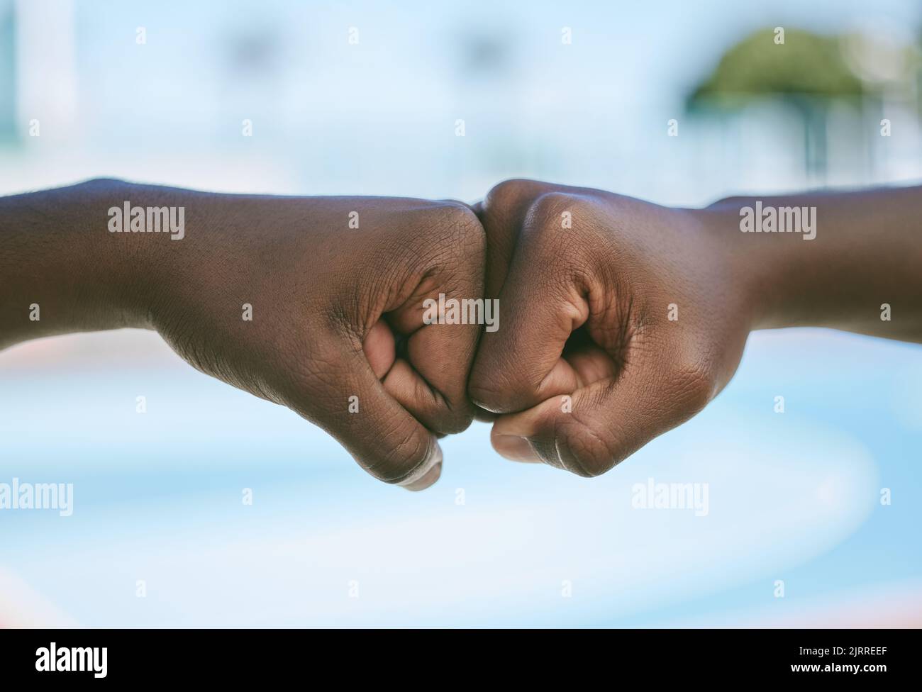 Success, support and hands giving fist bump for motivation, celebration ...