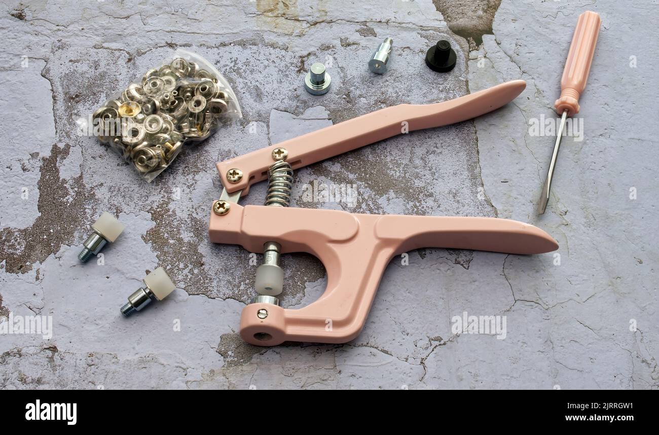 Attaching press stud hires stock photography and images Alamy