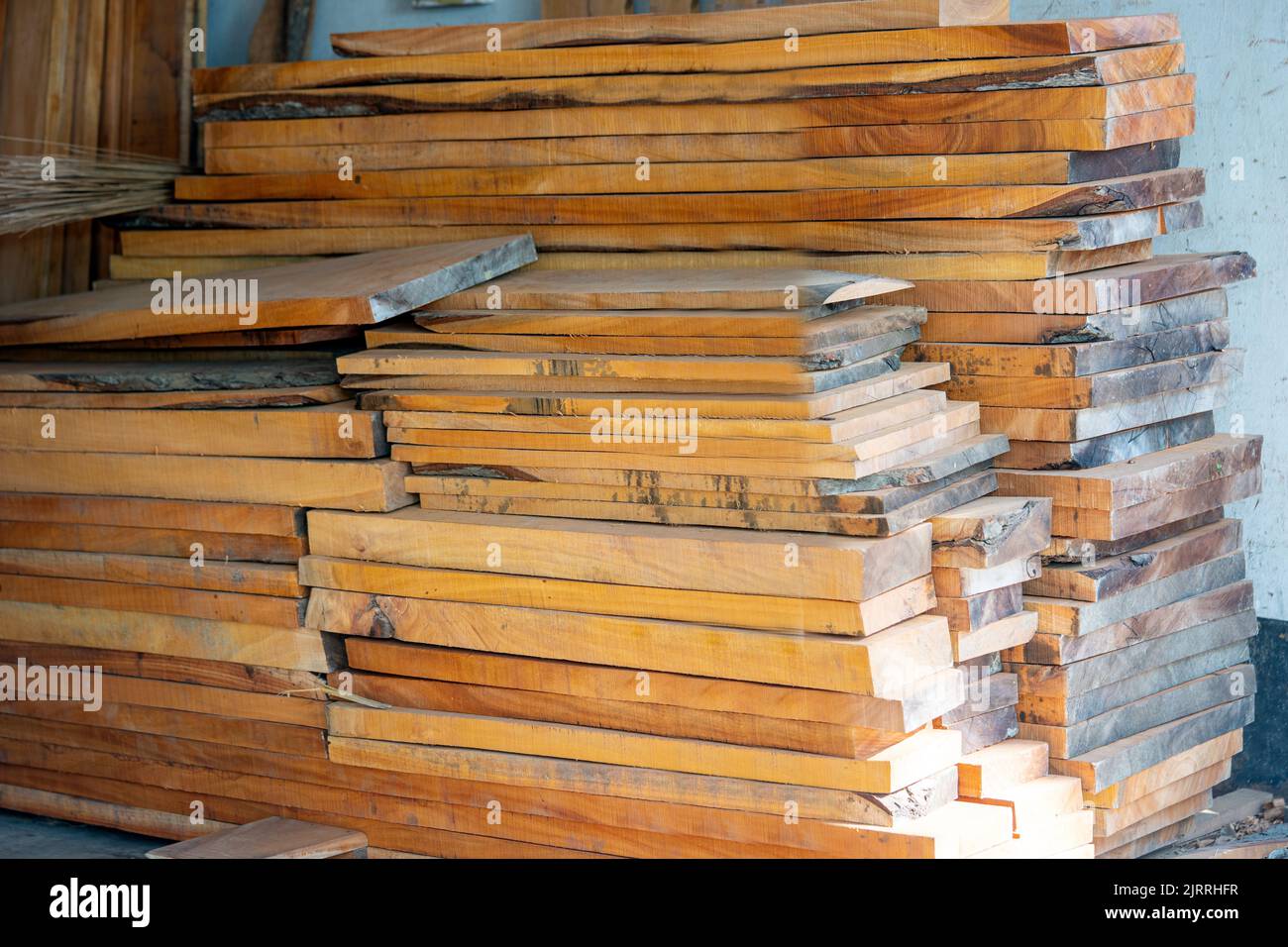 Eucalyptus Wood Plank With Blur Background. Wood Planks Are Stored For