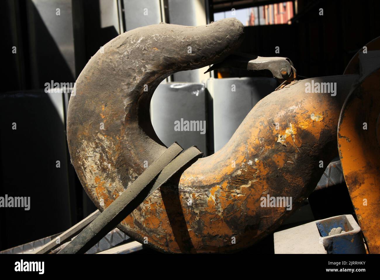 big crane hook inside factory Stock Photo Alamy