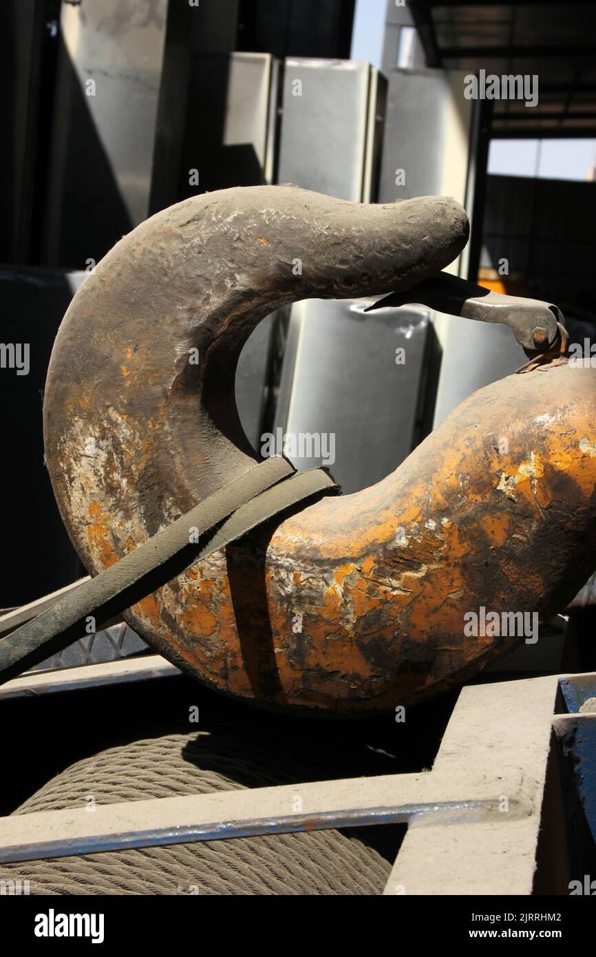 big crane hook inside factory Stock Photo Alamy