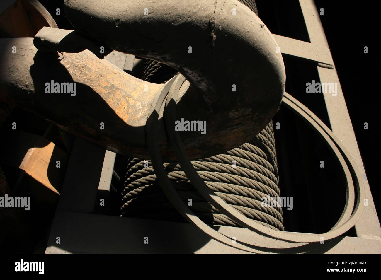 big crane hook inside factory Stock Photo Alamy