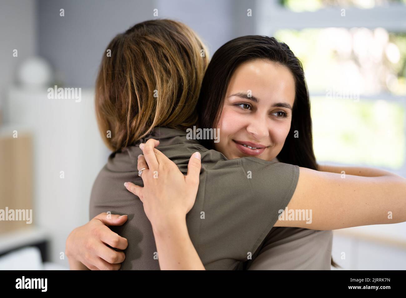 Disagreement And Mistrust. Sneaky Fake Female Pretends To Be A Friend Stock Photo