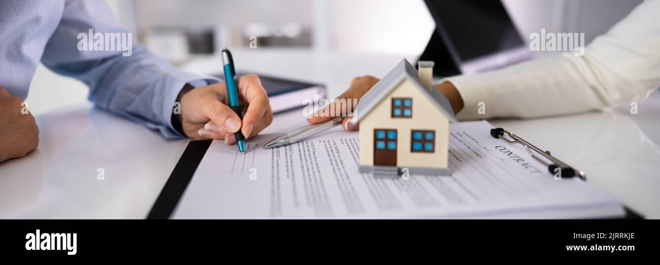 Property Management. House Lease And Ownership Deed Stock Photo