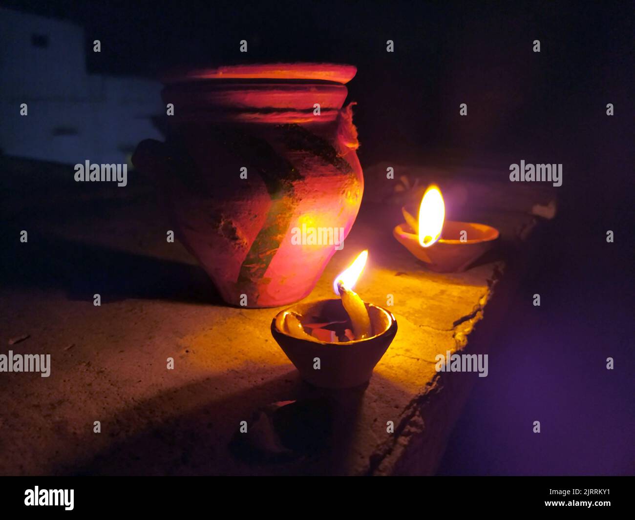 Traditional clay diya lamps lit during diwali celebration Stock Photo ...