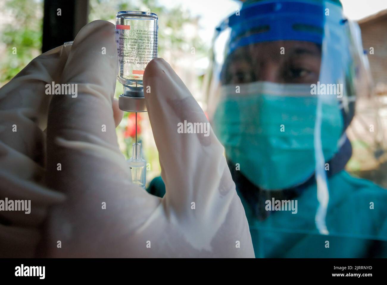 Temanggung, Central Java, Indonesia, Sept 23, 2021: Medical workers prepare injections of the Covid-19 vaccine. Through this method, vaccination participation is expected to increase because it can reach families who do not have access and are afraid to leave the house to avoid transmitting the virus. Stock Photo