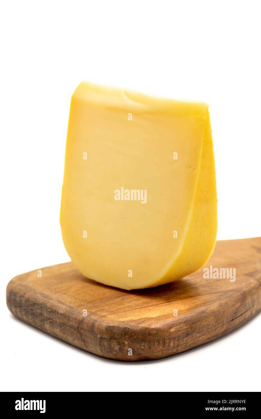 Yellow gouda cheese. Hard Dutch gouda cheese, isolated on white