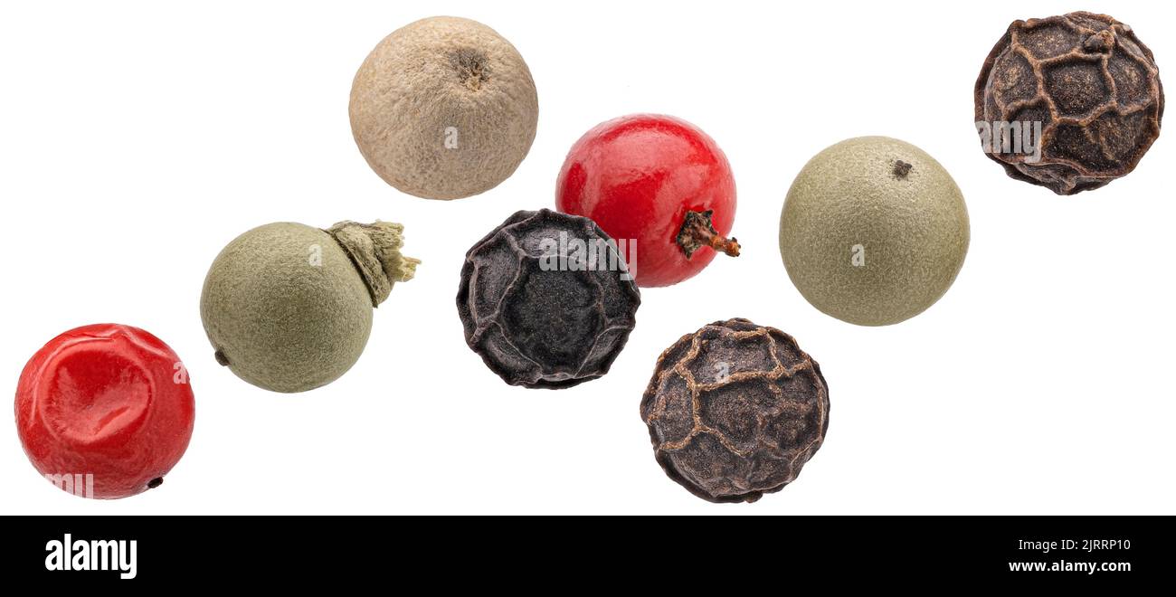 Falling peppercorns isolated on white background Stock Photo