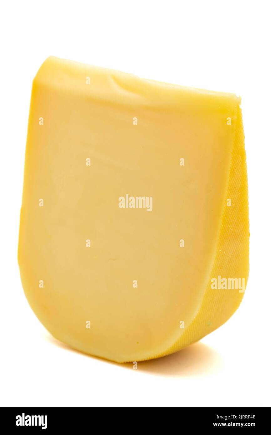Yellow gouda cheese. Hard Dutch gouda cheese, isolated on white