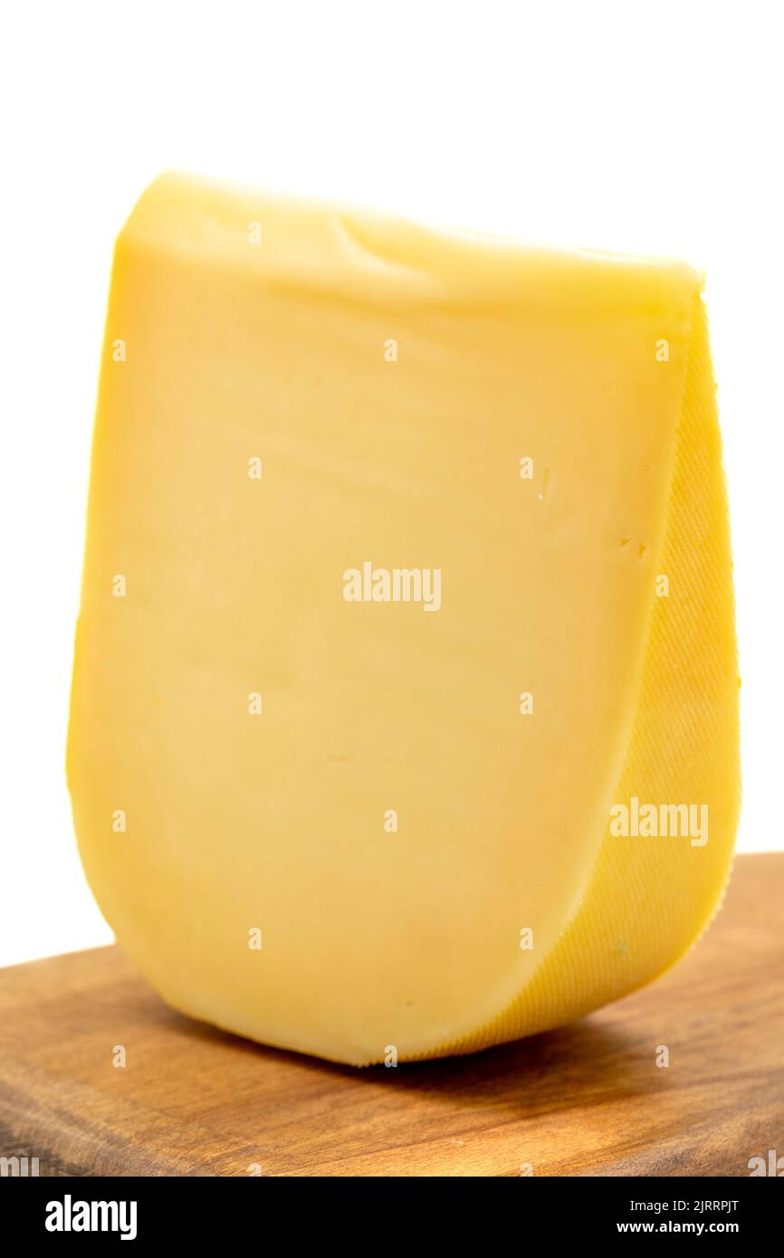Yellow gouda cheese. Hard Dutch gouda cheese, isolated on white