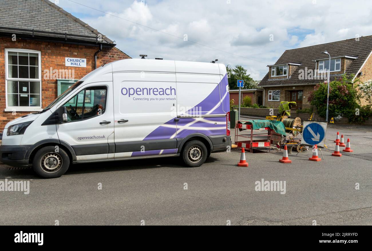Openreach working in road laying new cable underground Cherry Willingham High street Lincoln 2022 Stock Photo