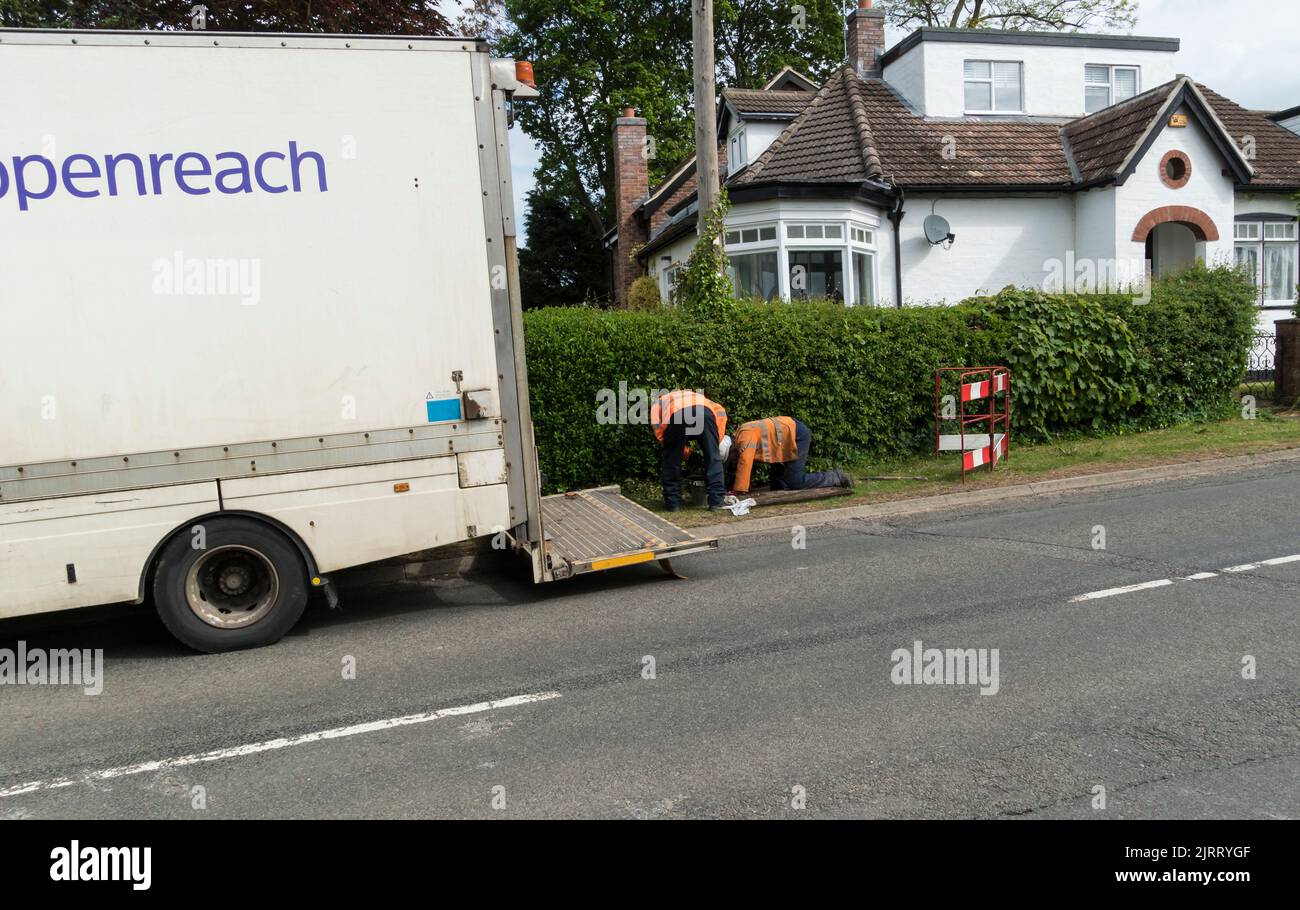 Openreach working in road laying new cable underground Cherry Willingham Waterford Lane Lincoln 2022 Stock Photo