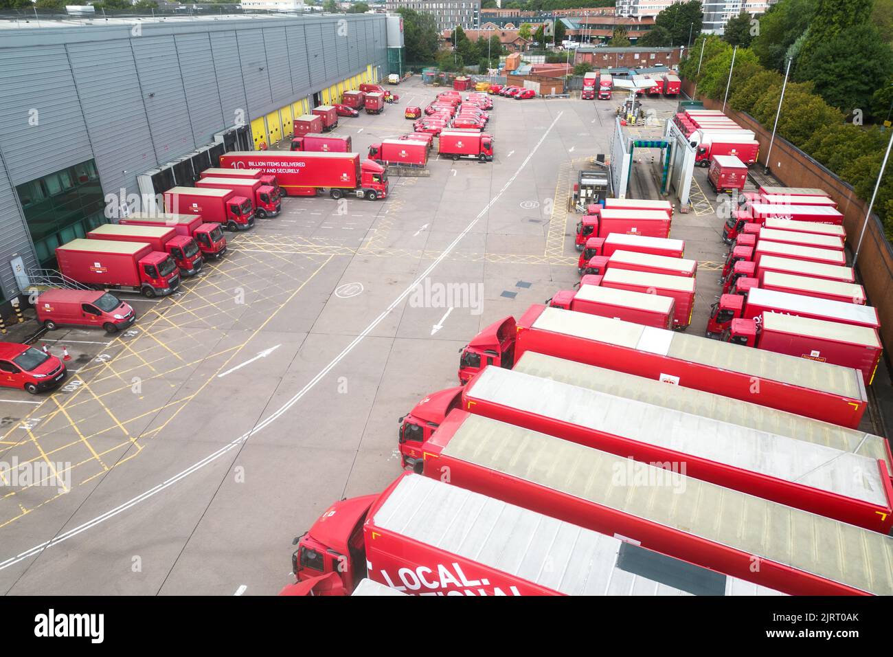St Stephens Street, Birmingham August 26th 2022 - Birmingham's Mail Centre on St Stephens Street in the Newtown area of the city is lined with unused lorries, trucks and vans as over 100,000 employees strike over pay disputes. A small amount of staff were seen sorting mail from one van and agency drivers and staff from Whistl arrived with important deliveries. Credit: Scott CM/Alamy Live News Stock Photo
