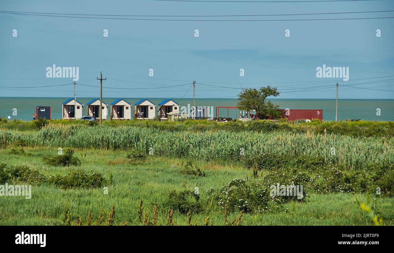 Dolzhanskaya spit Camping,  located on the coast of the Azov Sea, at the base of Dolgaya Spit. Stock Photo