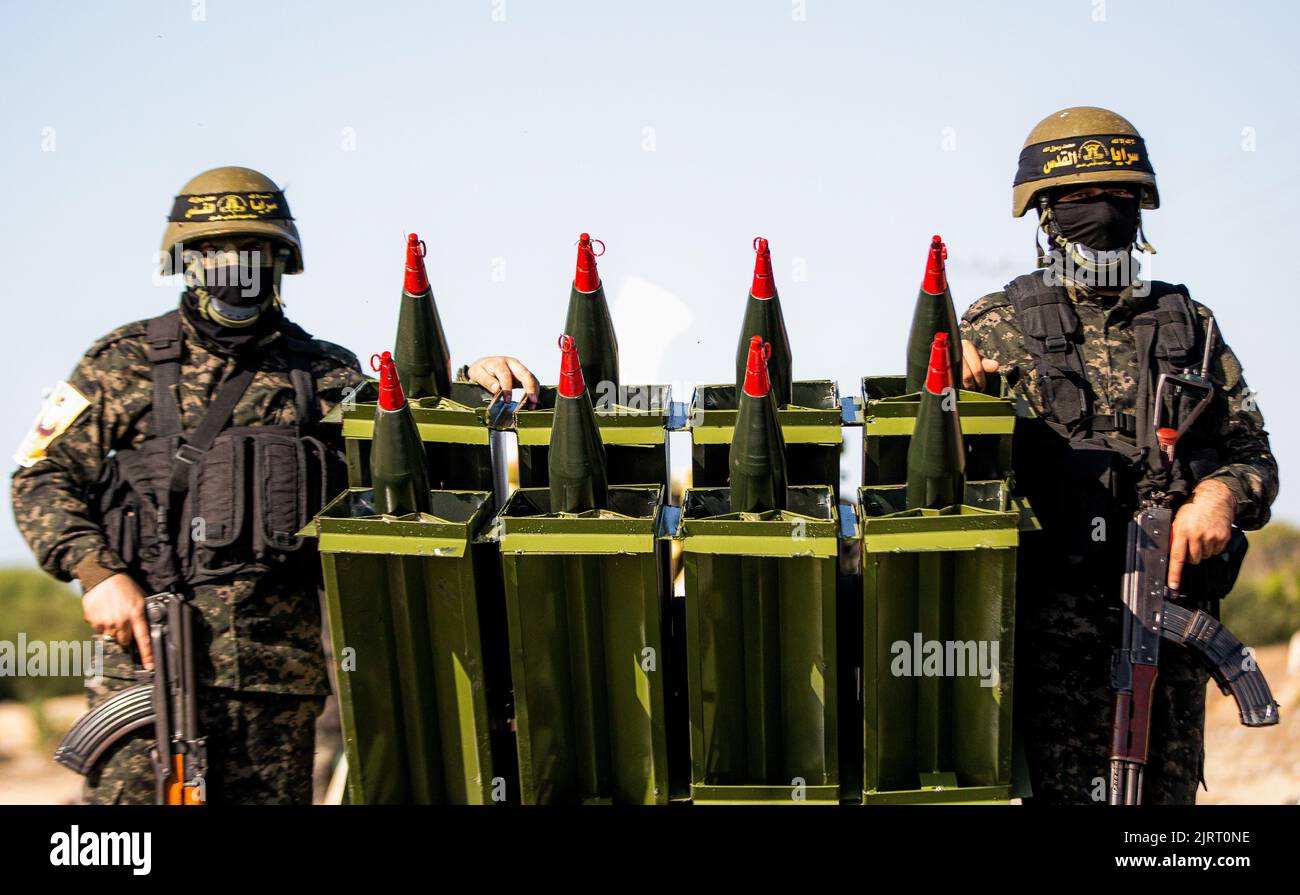 Rafah, Gaza Strip, Palestine. 24th Aug, 2022. Gaza Strip, Palestine. August 24, 2022. Fighters of the Al-Quds Brigades, the military wing of Islamic Jihad, hold a military parade in Rafah, in the southern Gaza Strip. A ceasefire between Israel and Islamic Jihad brokered by Egypt ended on 7th August, after three days of Israeli airstrikes on the Gaza Strip against the Islamic Jihad group, who retaliated by firing rockets into Israel (Credit Image: © Yousef Mohammed/IMAGESLIVE via ZUMA Press Wire) Stock Photo