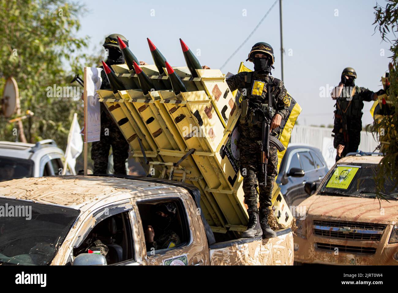 Rafah, Gaza Strip, Palestine. 24th Aug, 2022. Gaza Strip, Palestine. August 24, 2022. Fighters of the Al-Quds Brigades, the military wing of Islamic Jihad, hold a military parade in Rafah, in the southern Gaza Strip. A ceasefire between Israel and Islamic Jihad brokered by Egypt ended on 7th August, after three days of Israeli airstrikes on the Gaza Strip against the Islamic Jihad group, who retaliated by firing rockets into Israel (Credit Image: © Yousef Mohammed/IMAGESLIVE via ZUMA Press Wire) Stock Photo