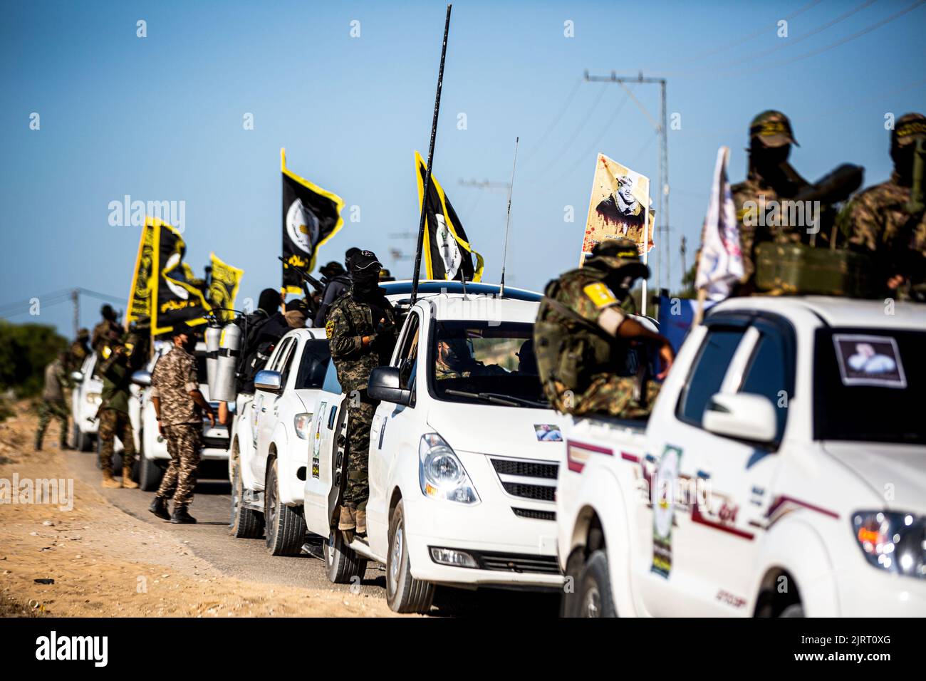 Rafah, Gaza Strip, Palestine. 24th Aug, 2022. Gaza Strip, Palestine. August 24, 2022. Fighters of the Al-Quds Brigades, the military wing of Islamic Jihad, hold a military parade in Rafah, in the southern Gaza Strip. A ceasefire between Israel and Islamic Jihad brokered by Egypt ended on 7th August, after three days of Israeli airstrikes on the Gaza Strip against the Islamic Jihad group, who retaliated by firing rockets into Israel (Credit Image: © Yousef Mohammed/IMAGESLIVE via ZUMA Press Wire) Stock Photo