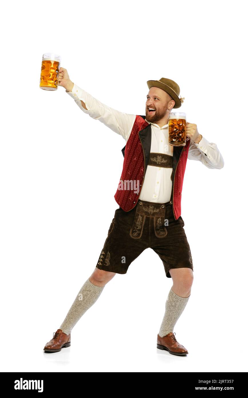 Portrait of young man wearing traditional Bavarian or German clothes