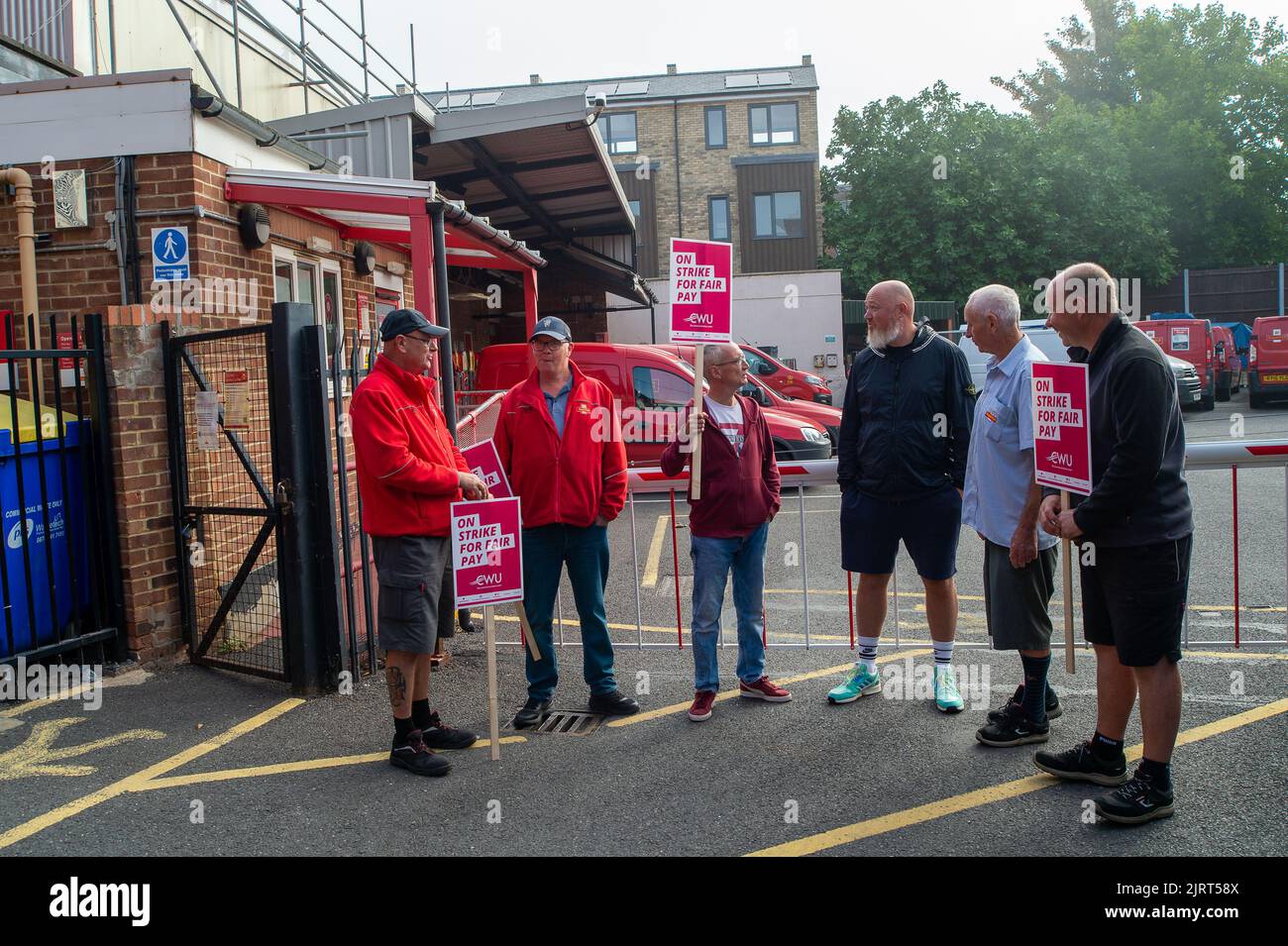 Windsor, Berkshire, UK. 26th August, 2022. Over 115,000 Royal Mail postal workers were on strike today over pay and stoppages. Postal workers were picketing at the Queen Elizabeth Delivery Office in Windsor today. Mail is not being collected today and three further strike days are planned. Credit: Maureen McLean/Alamy Live News Stock Photo