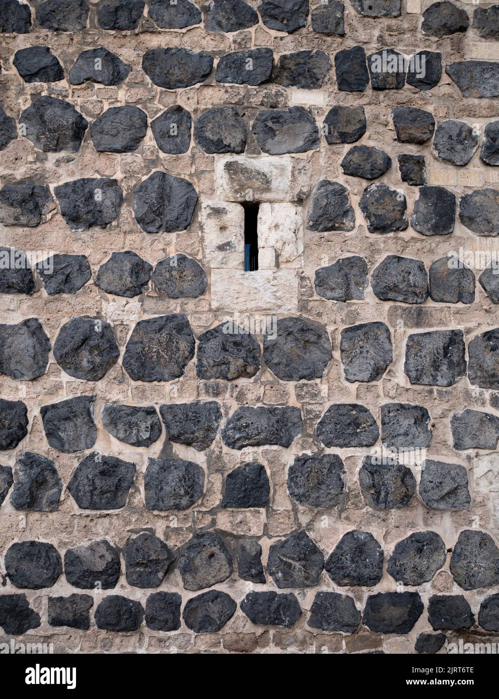 A vertical view of a rough stone wall Stock Photo Alamy