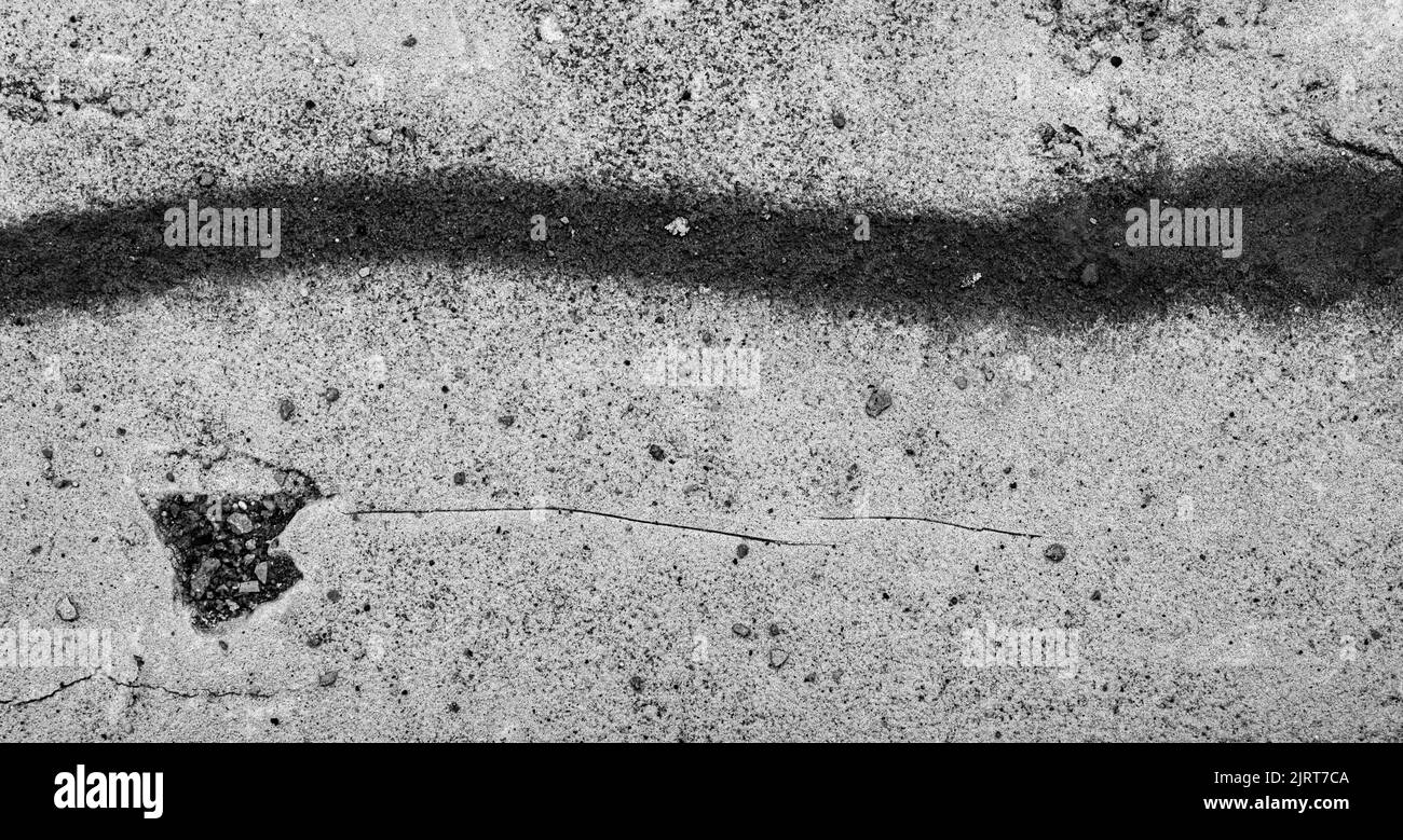 Cement floor at construction site. Abstract grungy gray floor interior