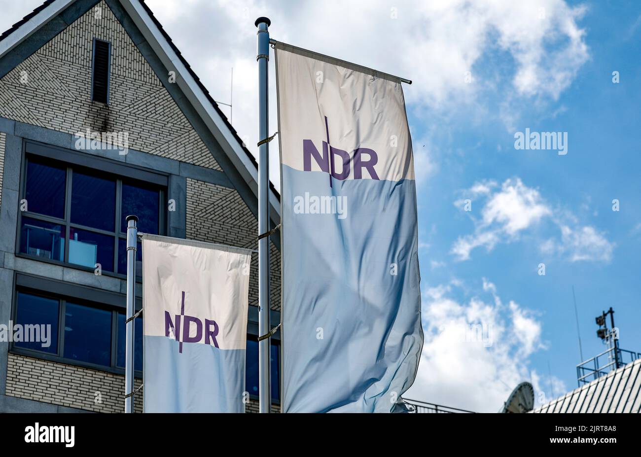 25 August 2022, Schleswig-Holstein, Kiel: Flags with the NDR logo in ...