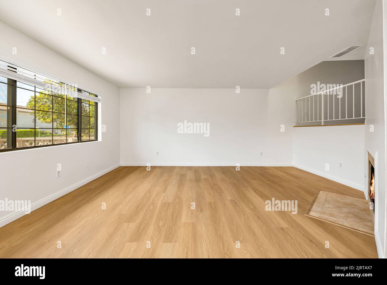 An interior of an empty room with with white walls Stock Photo Alamy