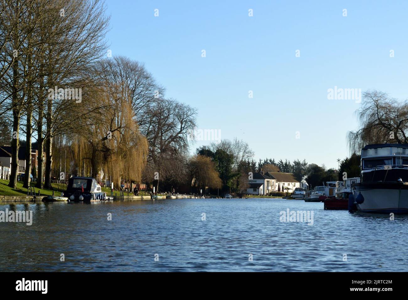 The River Yare at Thorpe Green, with the Rushcutters pub in the background, on the outskirts of Norwich, Norfolk, UK. Stock Photo