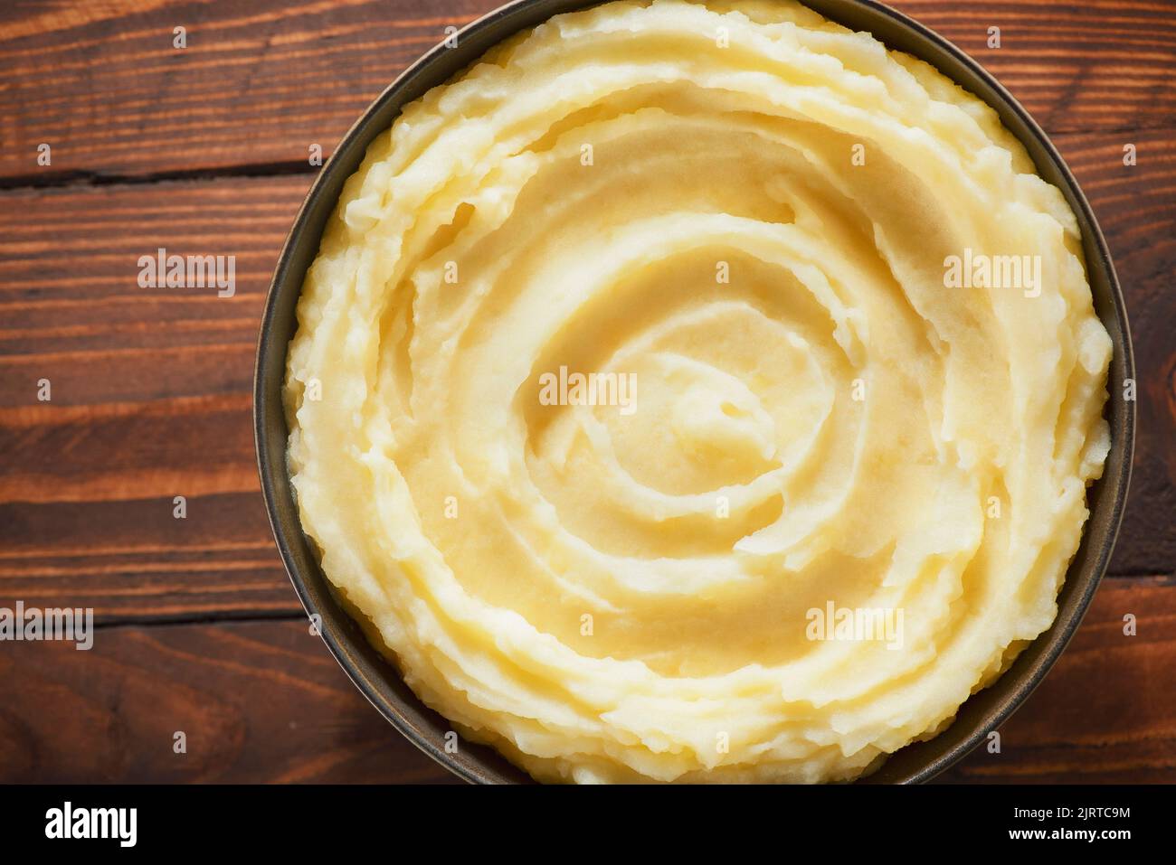 Delicious creamy mashed potatoes. Top View with copy space. Stock Photo