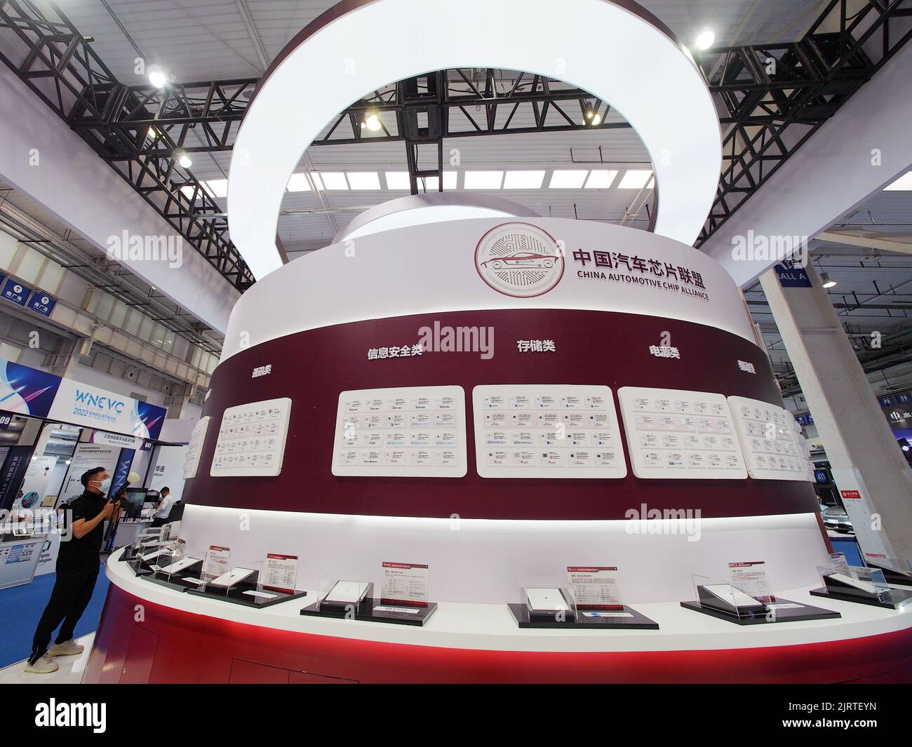 BEIJING, CHINA - AUGUST 26, 2022 - Visitors view domestic automotive chips at China Core's booth during the '2022 World New Energy Vehicle Congress' a Stock Photo