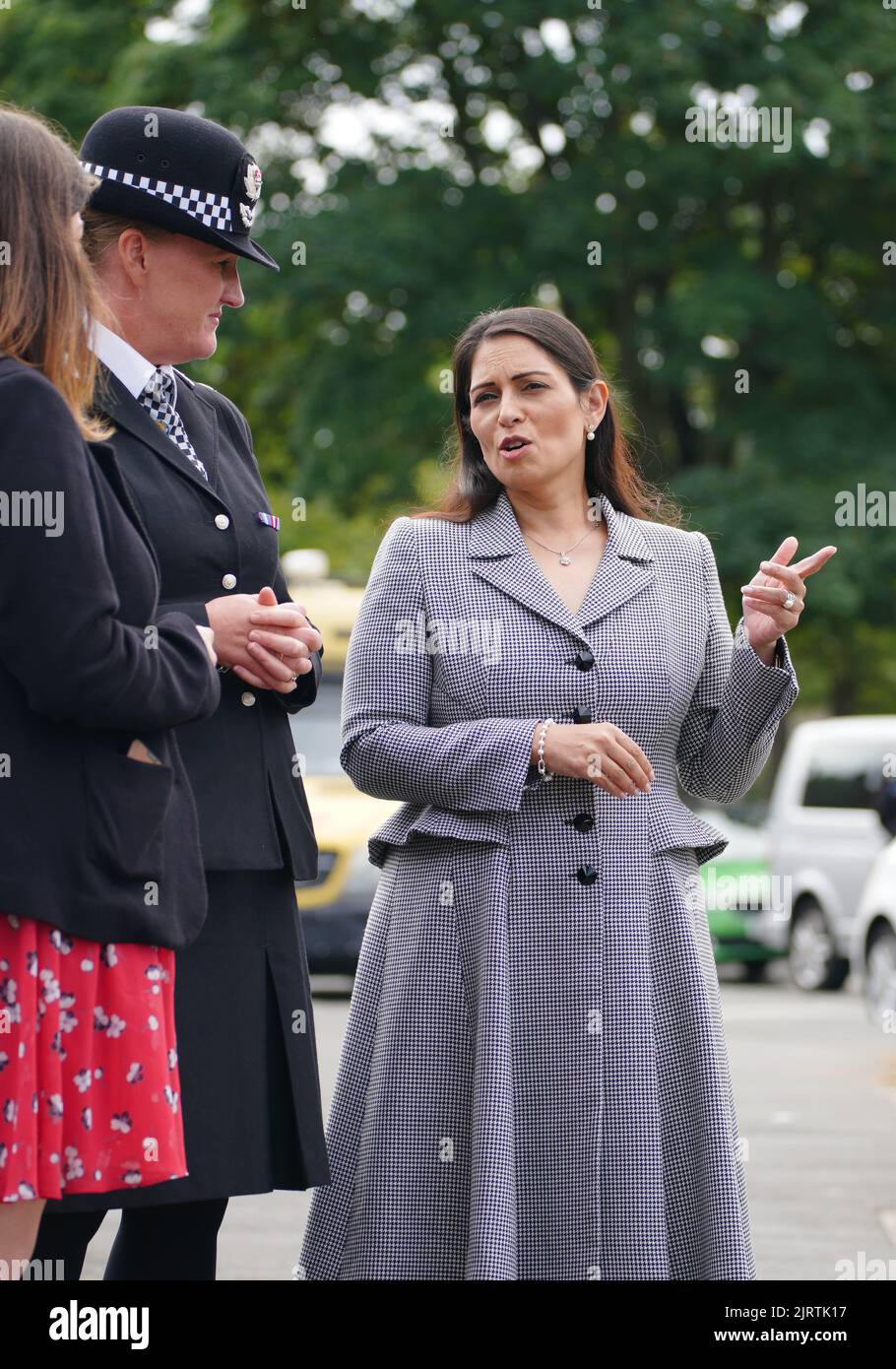 Home Secretary Priti Patel (right) visits the scene in Kingsheath ...