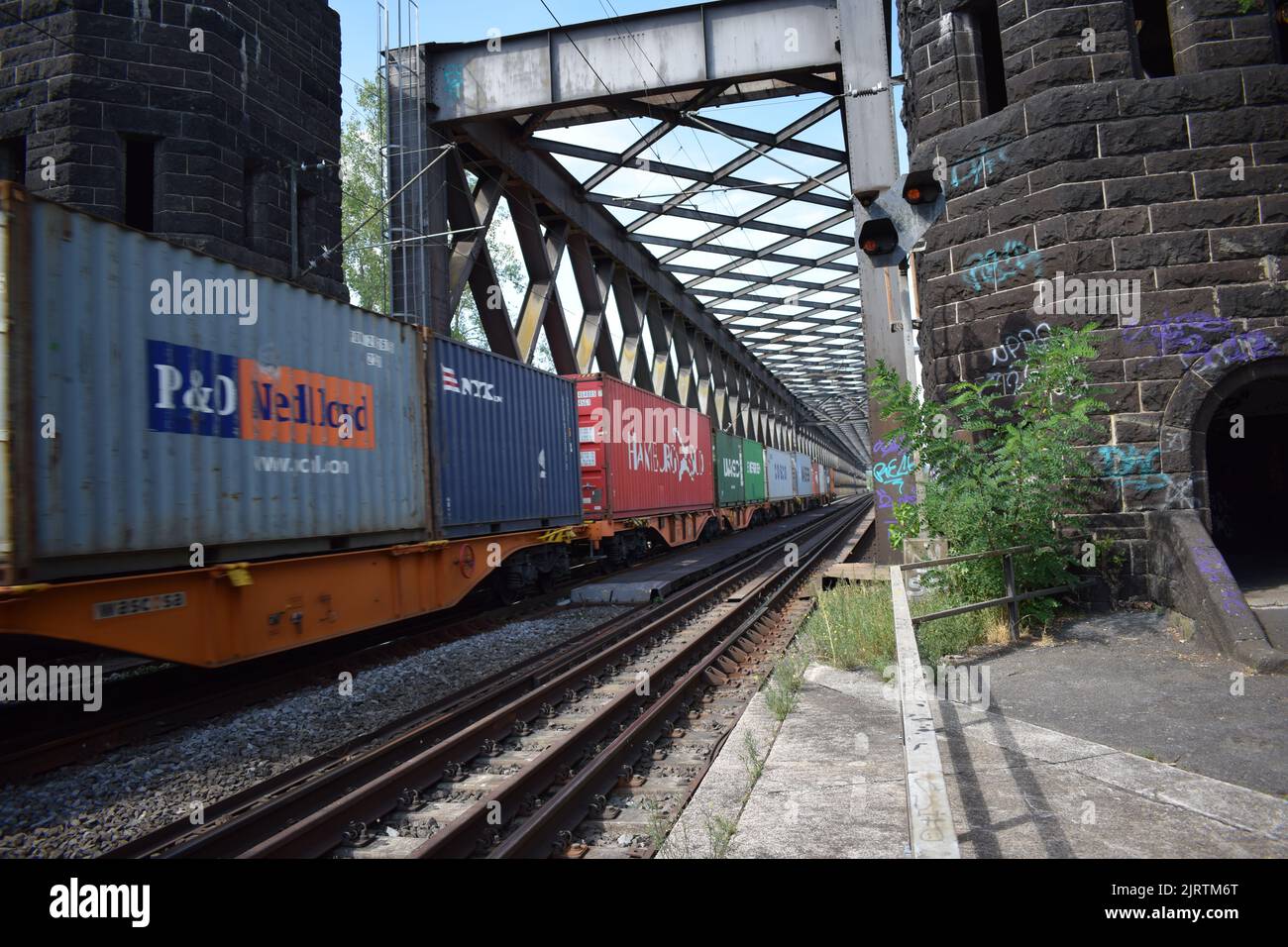 freight train running across the old railroad bridge near Urmitz and