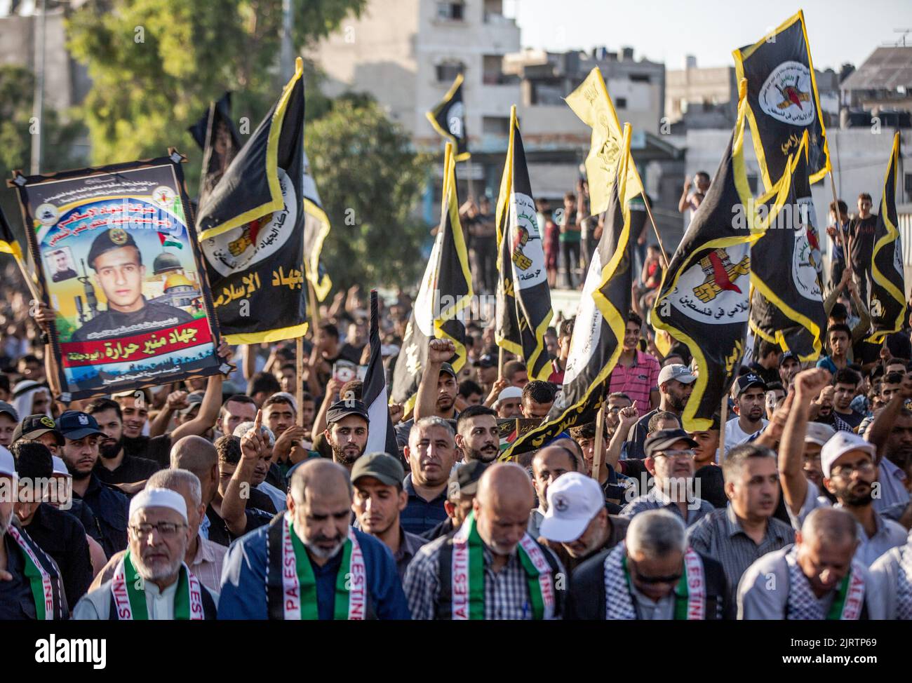Islam Rally Islamic Jihad supporters wave their flags while chanting slogans during ...