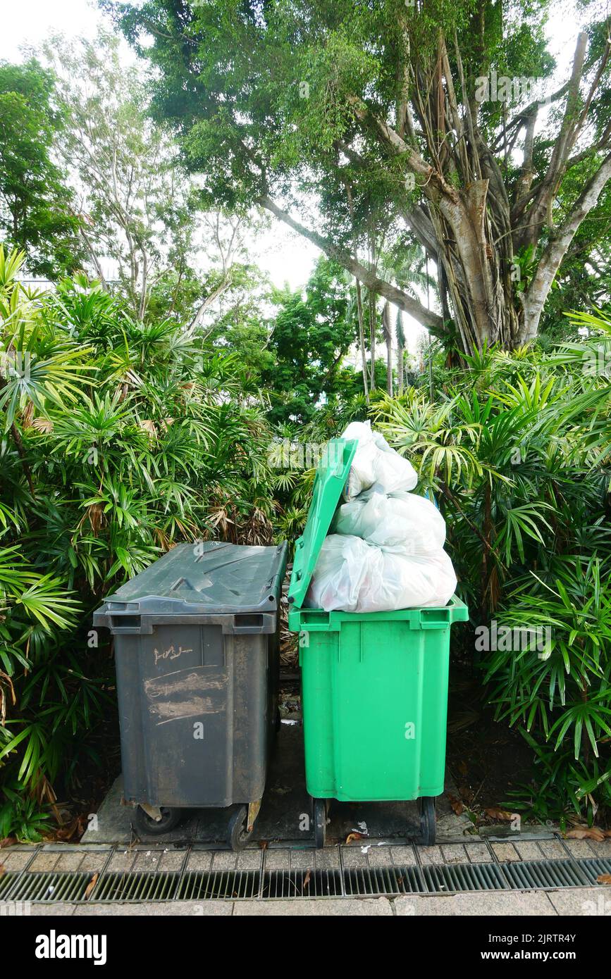 Bag with garbage and rubbish bin Stock Photo Alamy