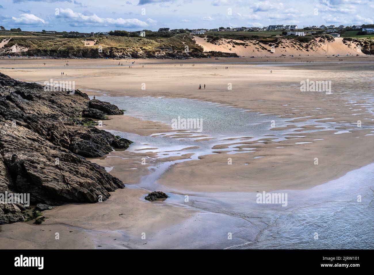 Low tide at the award winning Crantock Beach on the coast of Newquay in Cornwall in the UK. Stock Photo