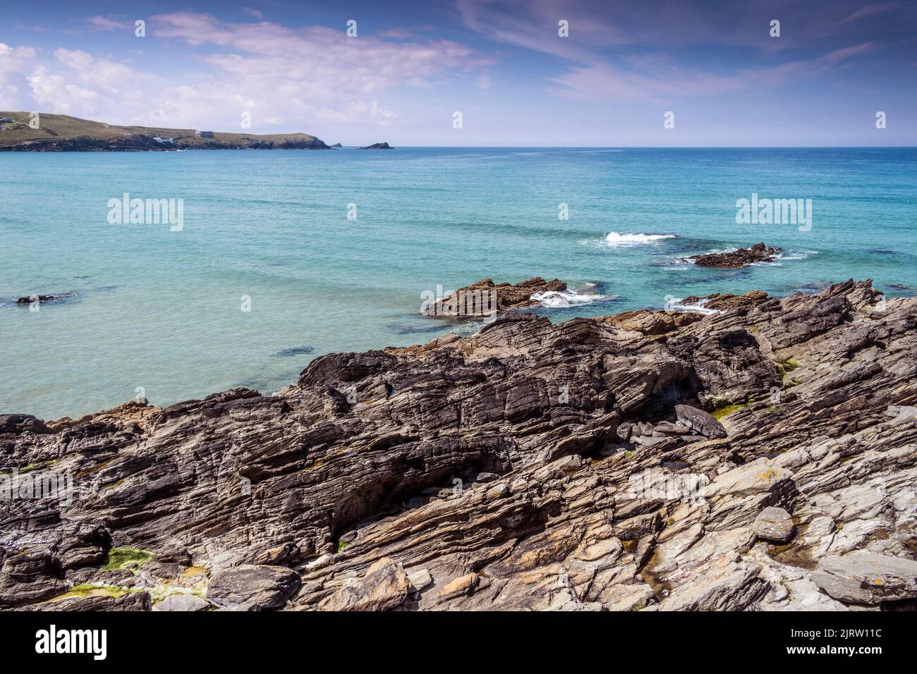 Sunshine and blue skies over Fistral Bay in Newquay in Cornwall in the UK. Stock Photo