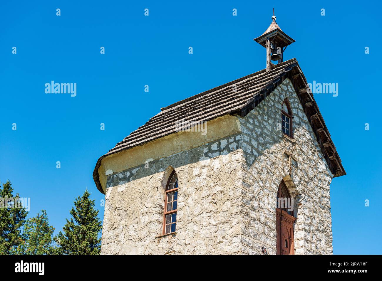 Small Church or Chapel called Almkapelle Maria Schnee (Our Lady of the Snow), Italy-Austria border, Feistritz an der Gail, Carinthia,  Austria, Europe Stock Photo