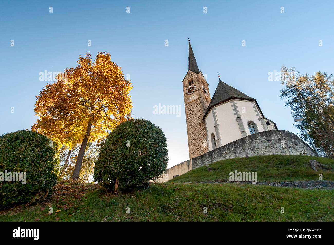 Reformed Church of Scuol town and river valley, Engadin, Switzerland on October 23, 2012. Stock Photo