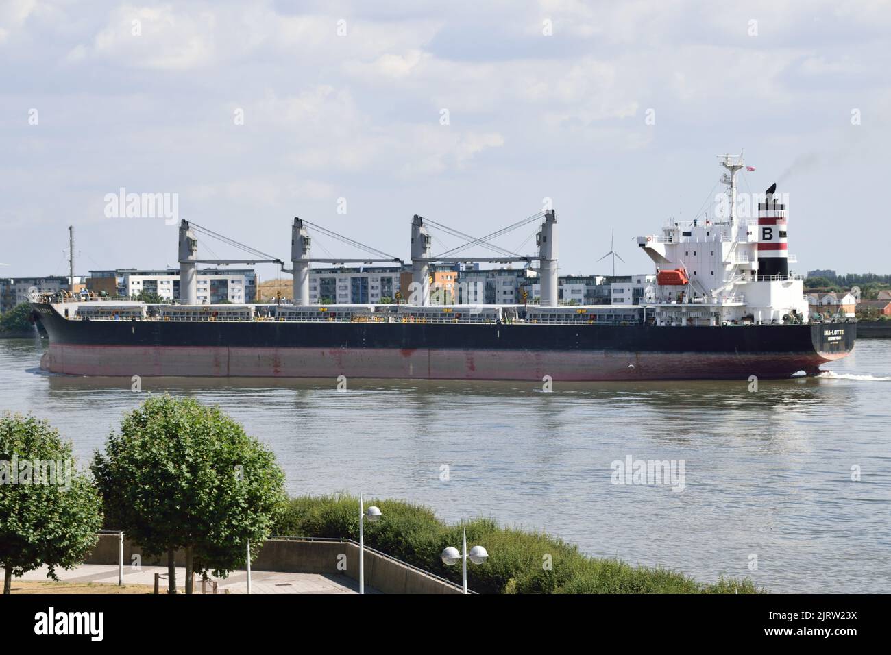 Bulk Carrier INA LOTTE departing London after unloading a cargo of cane sugar at Tate & Lyle Sugar's Thames Refinery at Silvertown Stock Photo