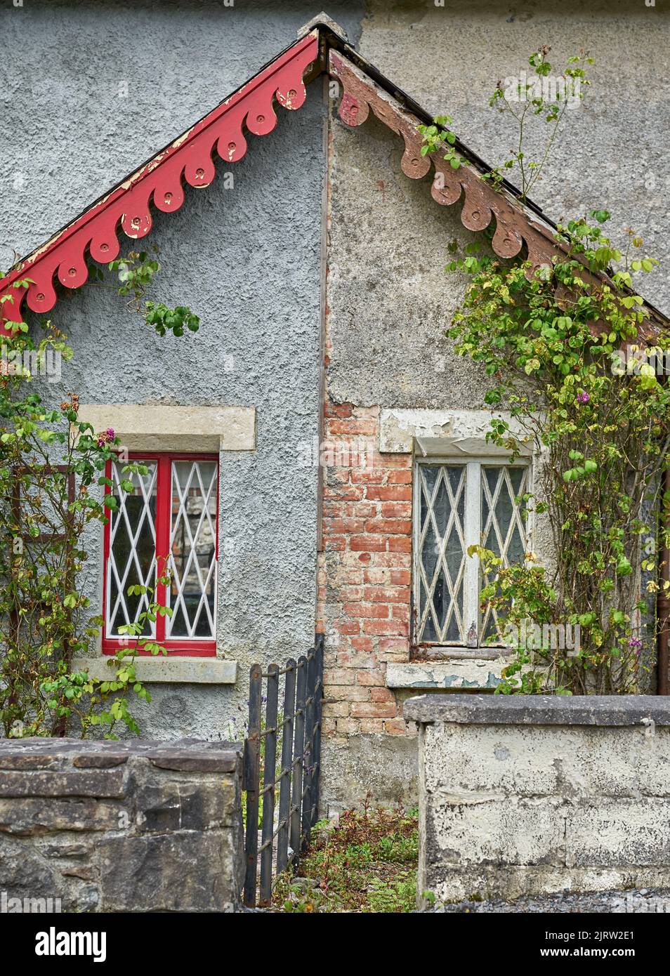 Two houses side by side, one looks good but the other is in bad shape ...