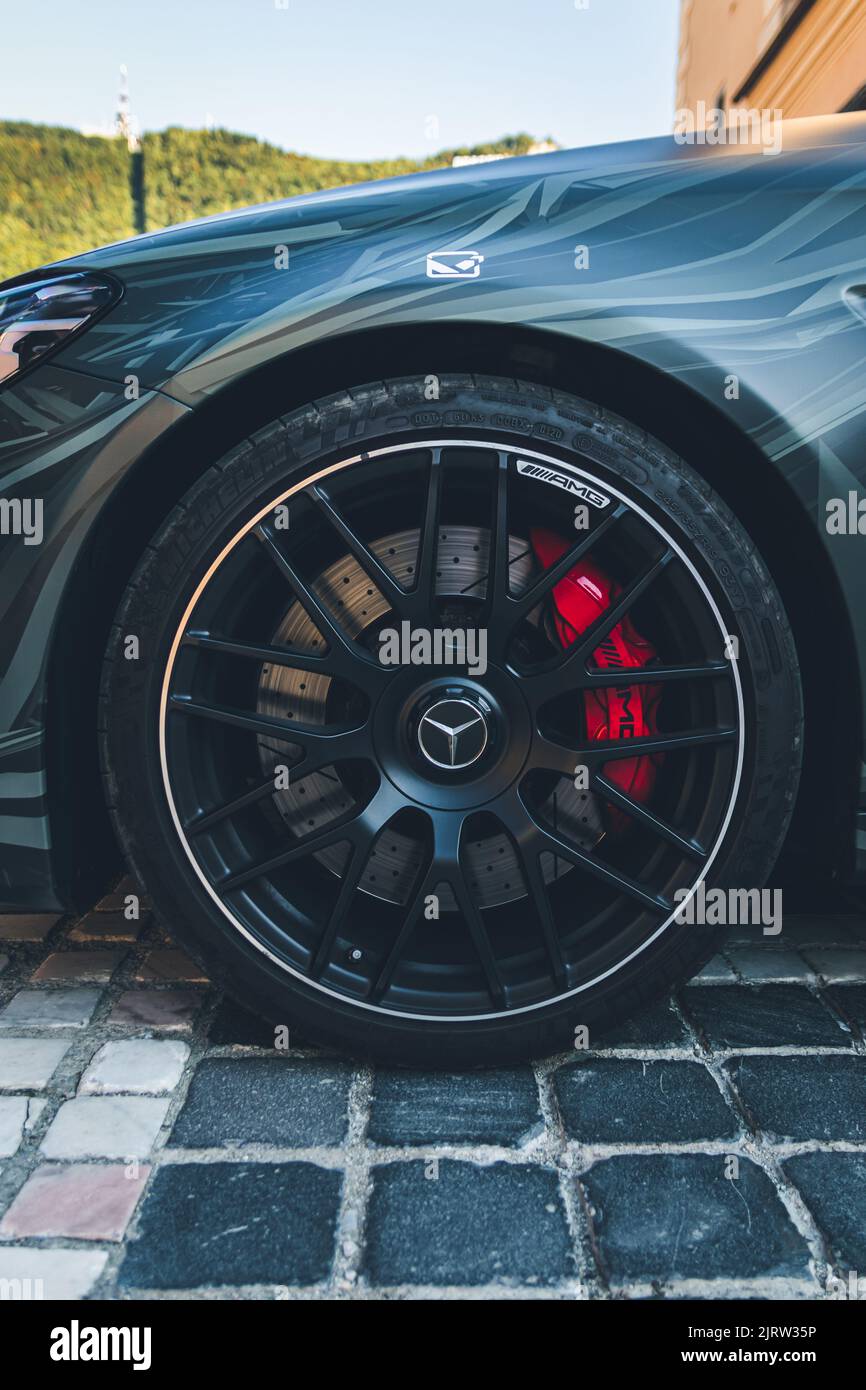 A Mercedes rims black with red calipers on the streets of Brasov
