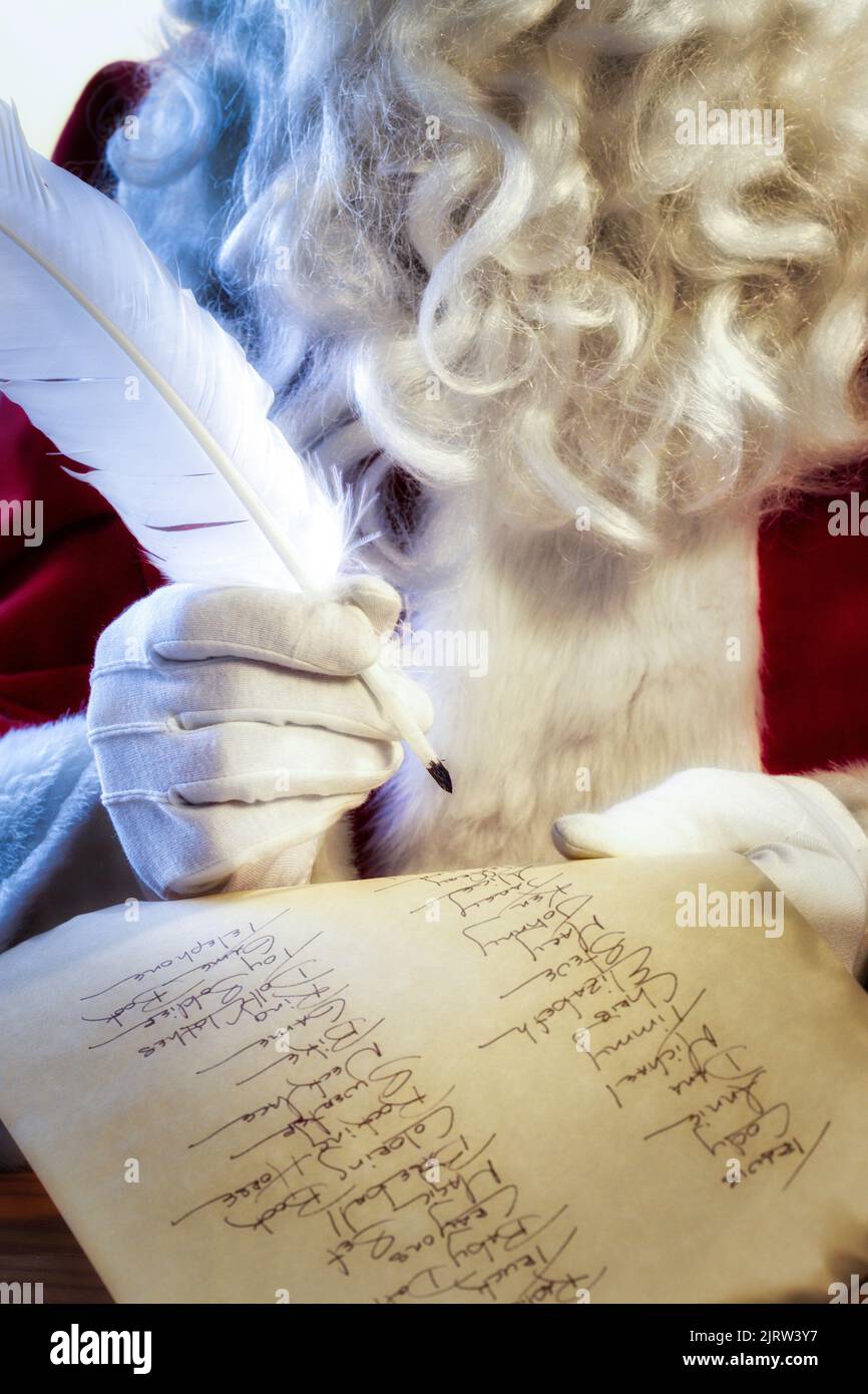 Santa Claus checks his list twice,, North Pole Stock Photo