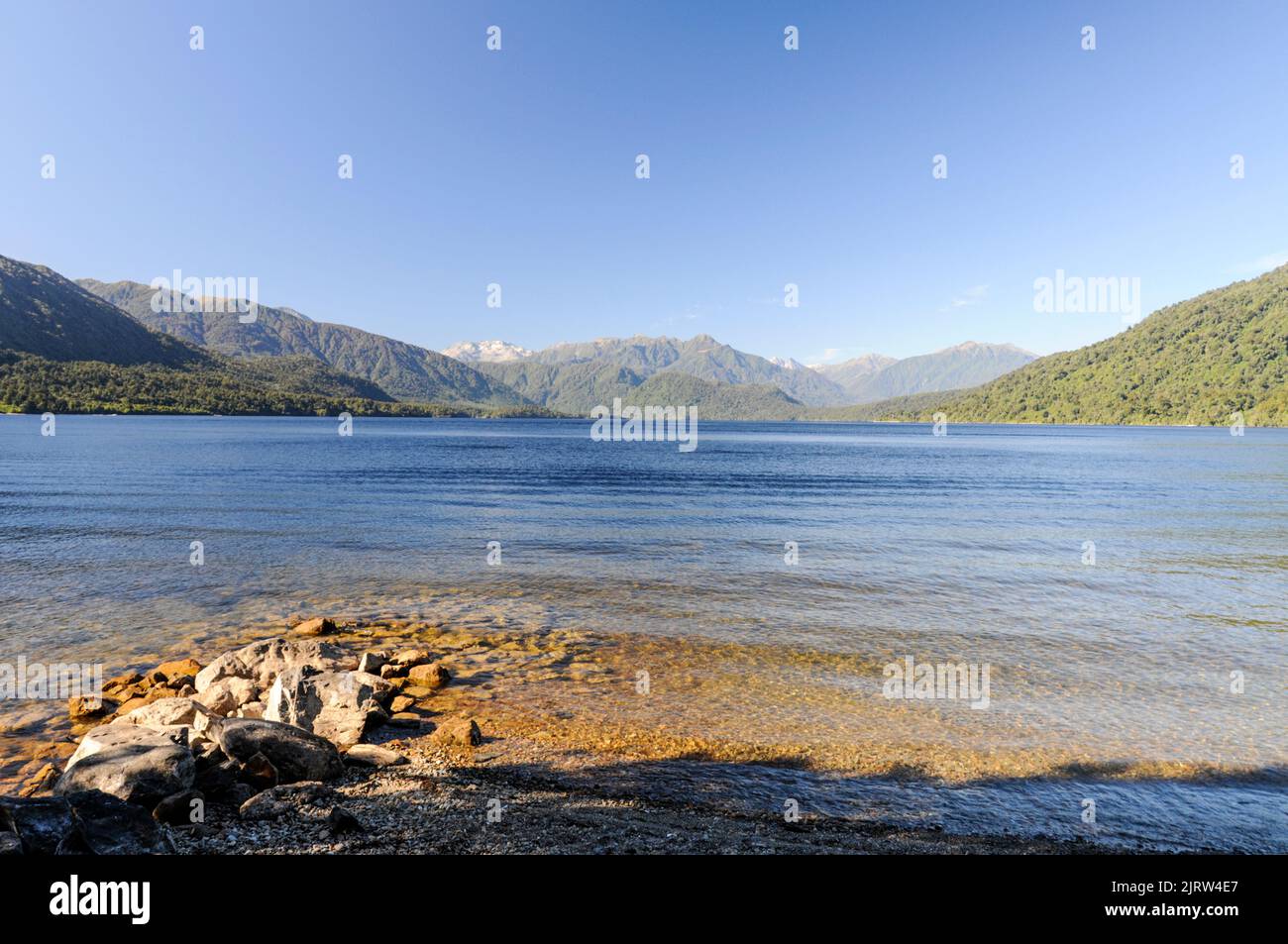 Lake Kaniere is 19 km east of Hokitika on the West Coast of south Island in New Zealand. It is an ideal lake for water sports, camp sites and walking Stock Photo