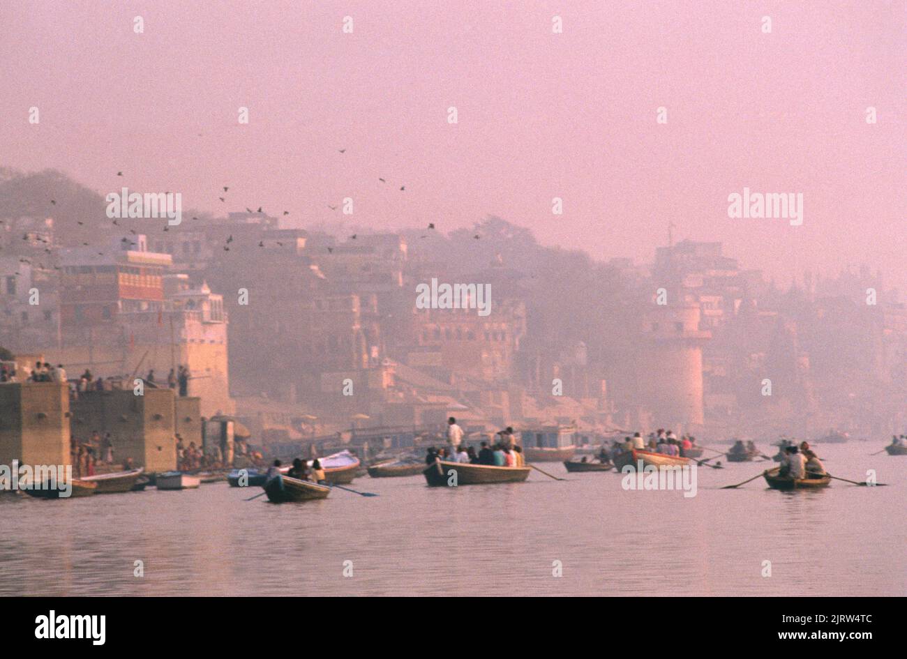 Varanasi India Boatmen on the Ganges (Banares) At Dawn Stock Photo