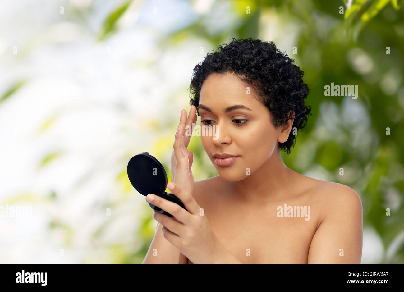 Woman curly hair mirror short hi-res stock photography and images - Alamy